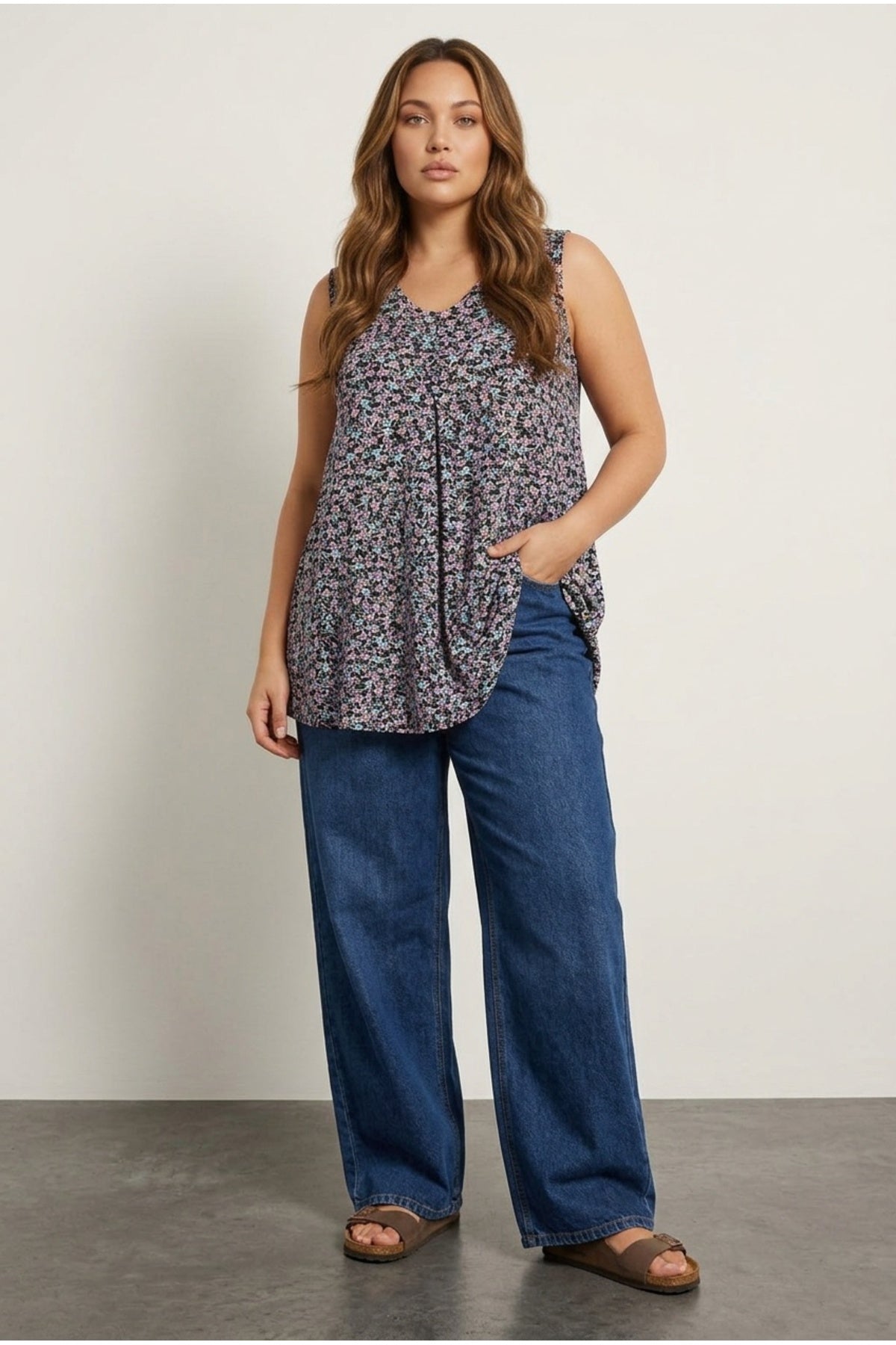 Plus Size Sleeveless V-Neck Floral Patterned Flared Hem Blouse