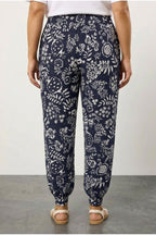Plus Size Carrot Fit Printed Pocketed Trousers