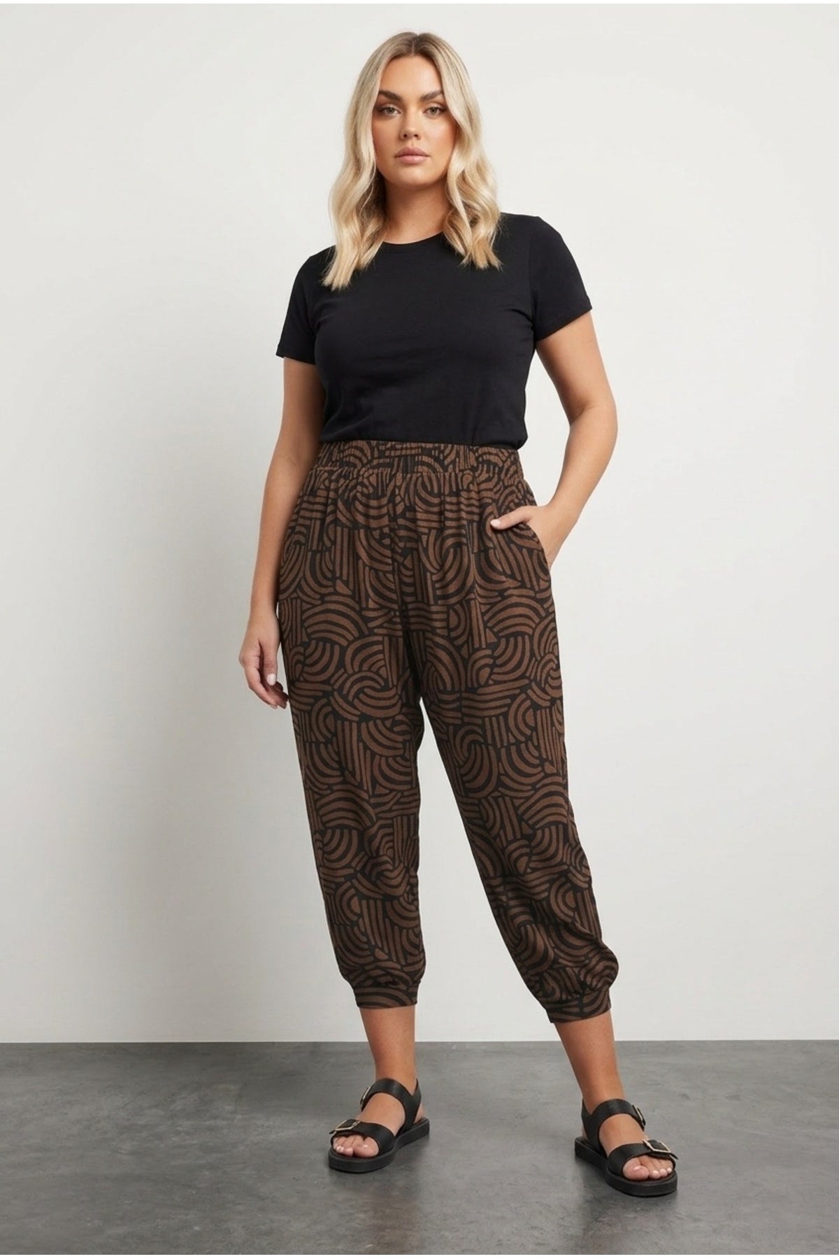 Plus Size Abstract Patterned Pants with Elasticated Waist, Cuffs, and Pockets