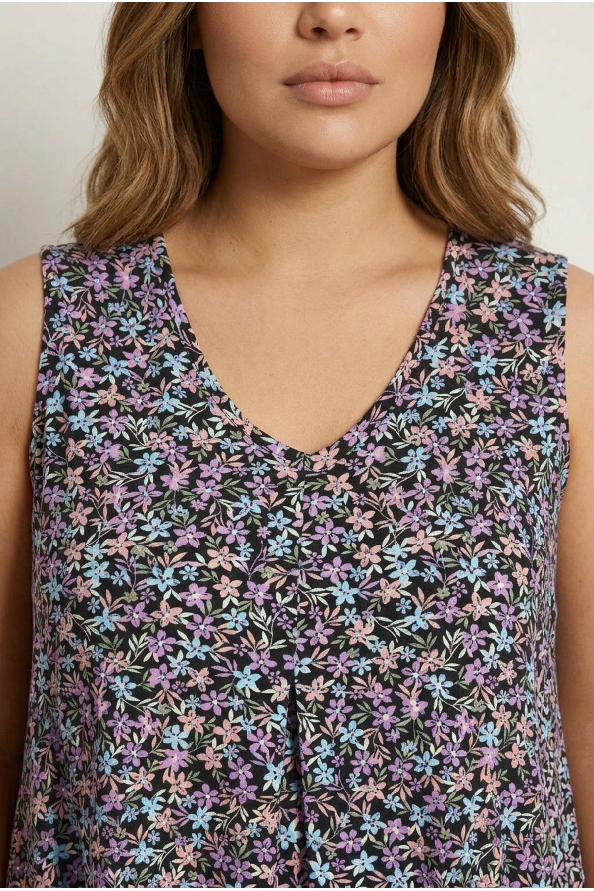 Plus Size Sleeveless V-Neck Floral Patterned Flared Hem Blouse