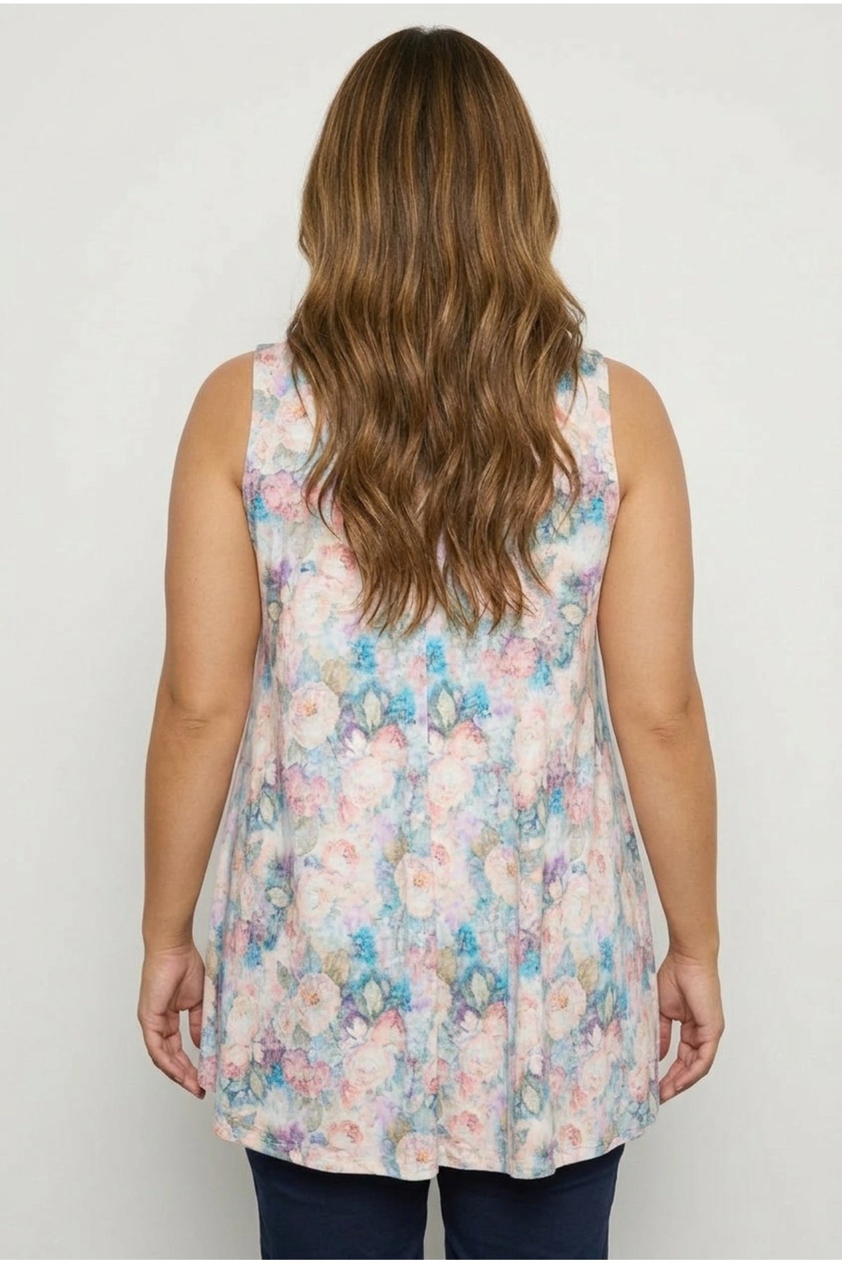 Plus Size Sleeveless V-Neck Floral Patterned Flared Hem Blouse