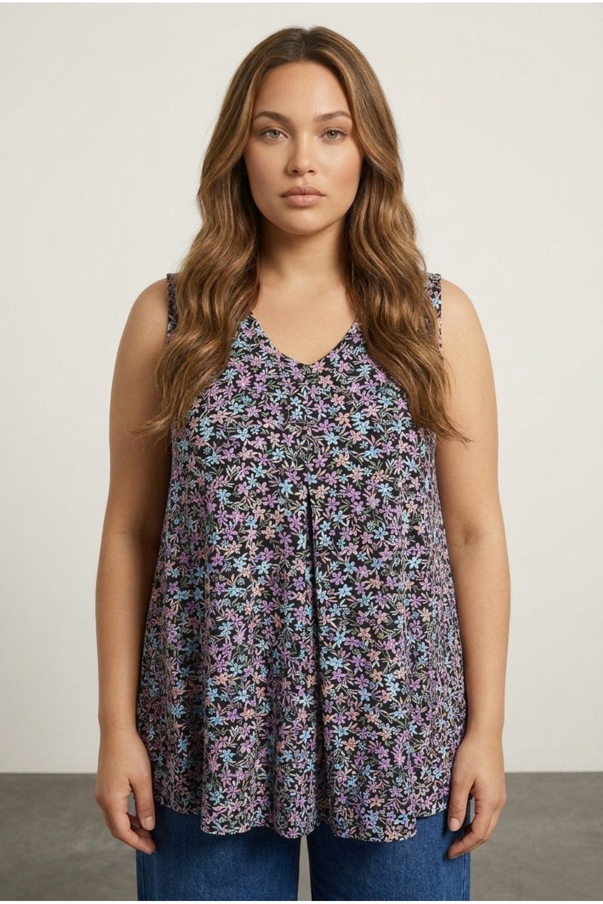 Plus Size Sleeveless V-Neck Floral Patterned Flared Hem Blouse