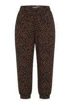 Plus Size Abstract Patterned Pants with Elasticated Waist, Cuffs, and Pockets