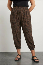 Plus Size Abstract Patterned Pants with Elasticated Waist, Cuffs, and Pockets